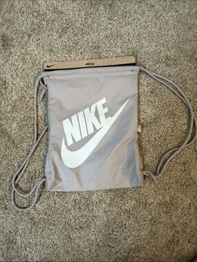 Nike Light Gray Drawstring Backpack with White Logo